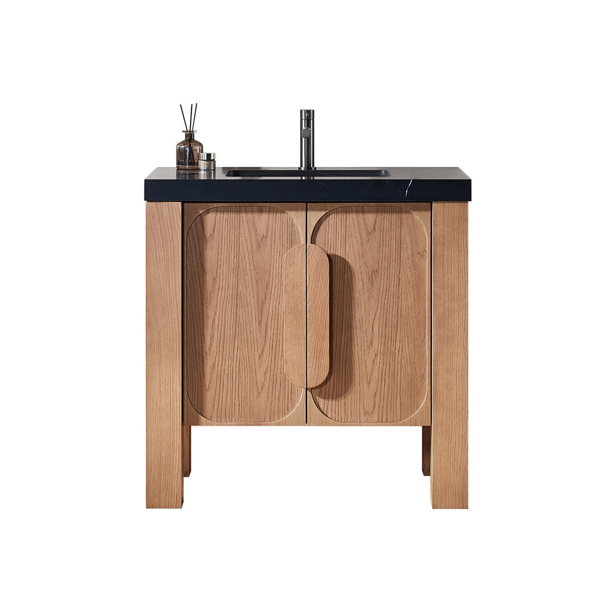Bathroom with wooden vanity, white countertop, and decorative elements.
