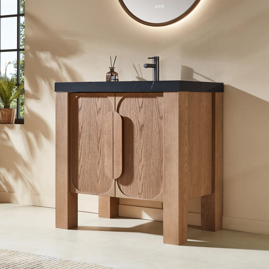 Bathroom with wooden vanity, white countertop, and decorative elements.