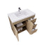 Bathroom vanity with open drawers and a white countertop on a white background