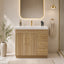 Bathroom vanity with wooden cabinet, white countertop, and decorative elements.