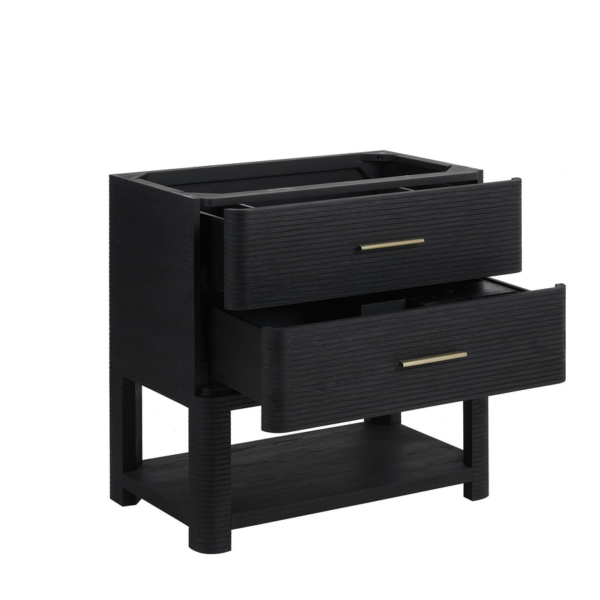 A modern bathroom vanity with a light oak wood frame, six drawers, an open lower shelf, and a white marble top with an integrated sink. The vanity is styled in a bright bathroom with a white freestanding tub, a gold faucet, and a glass shower stall in the background.