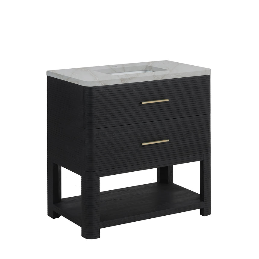 A modern bathroom vanity with a light oak wood frame, six drawers, an open lower shelf, and a white marble top with an integrated sink. The vanity is styled in a bright bathroom with a white freestanding tub, a gold faucet, and a glass shower stall in the background.