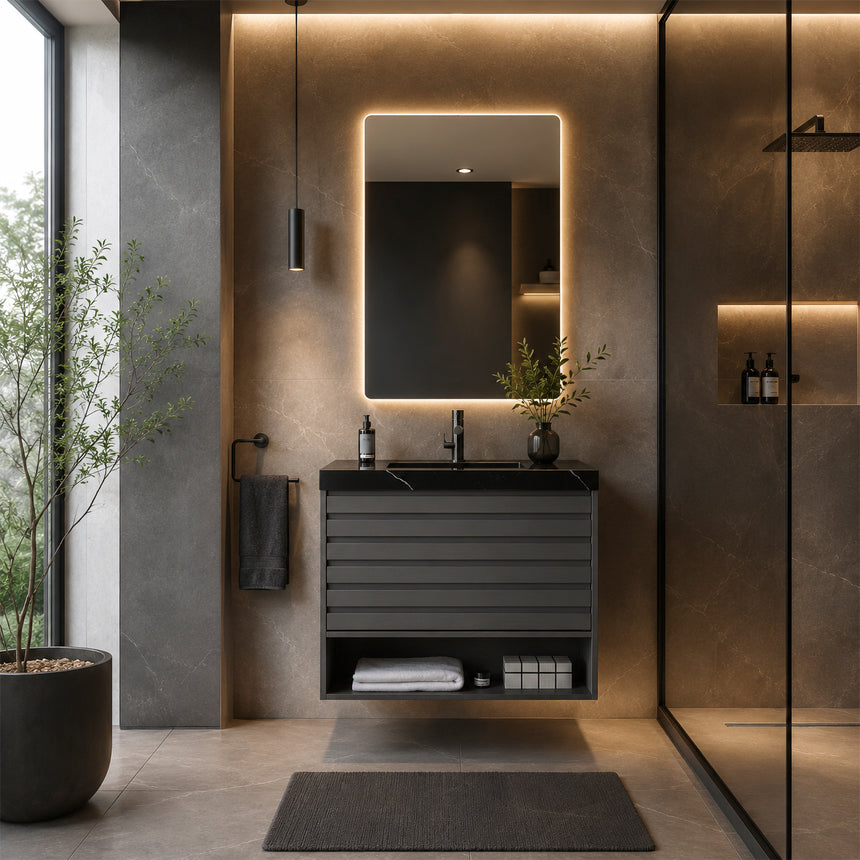 A modern floating bathroom vanity with a light oak wood finish, a white countertop, and an integrated sink, shown in a styled bathroom setting with a bathtub, shower glass, and decorative plants.