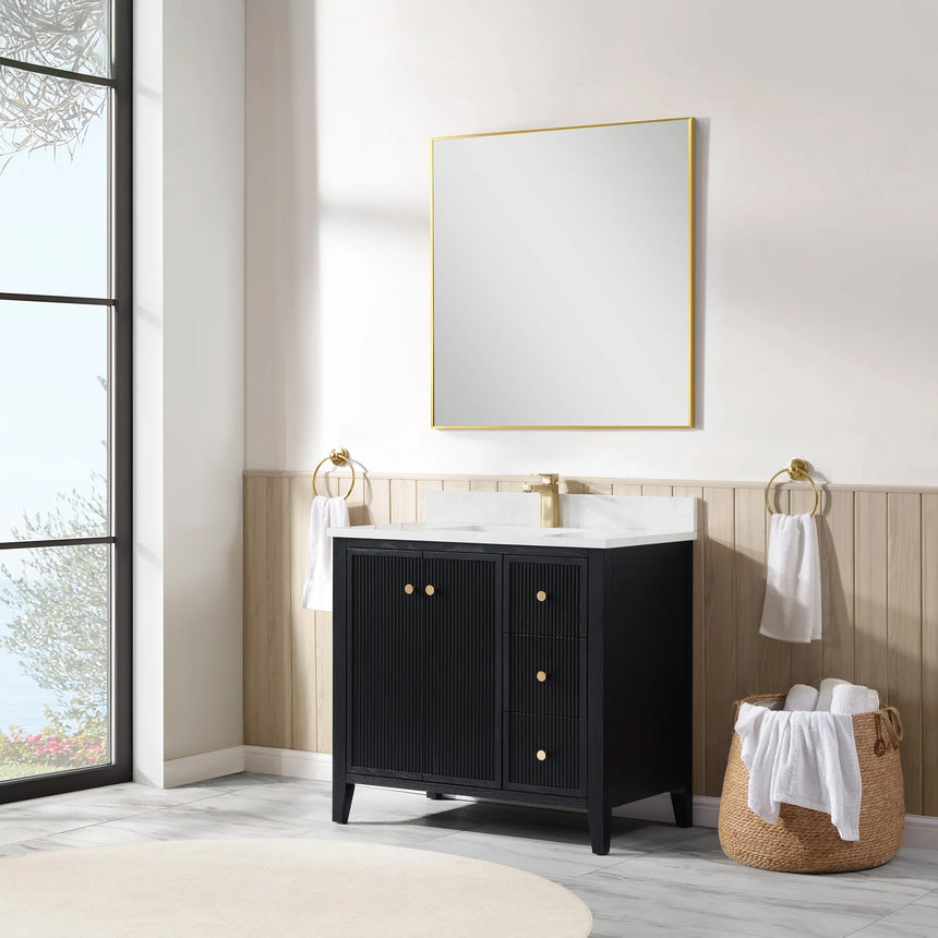Bathroom vanity with double sink, mirrors, and towels in a well-lit room.