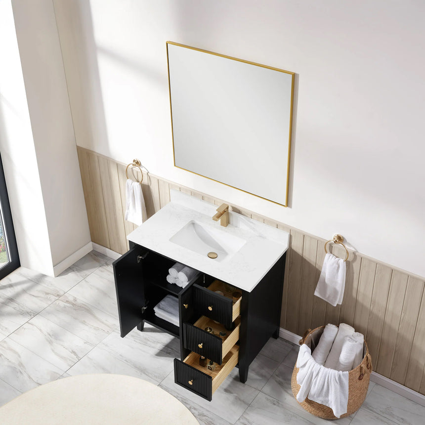 Bathroom vanity with double sink, mirrors, and towels in a well-lit room.