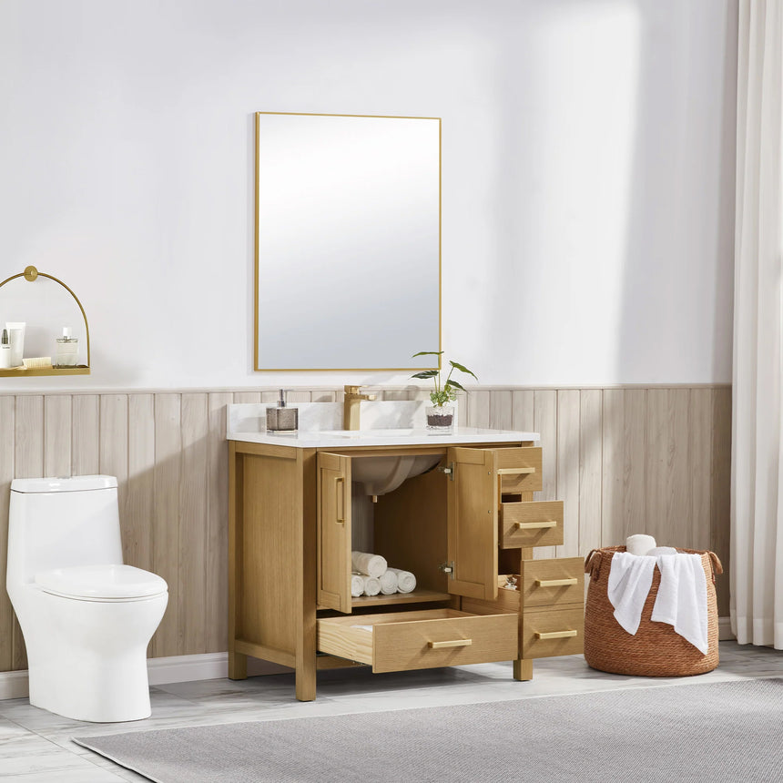 Bathroom vanity with wooden cabinets and white countertop, featuring a toilet and towel on the side.