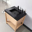 Bathroom vanity with black countertop and wooden base