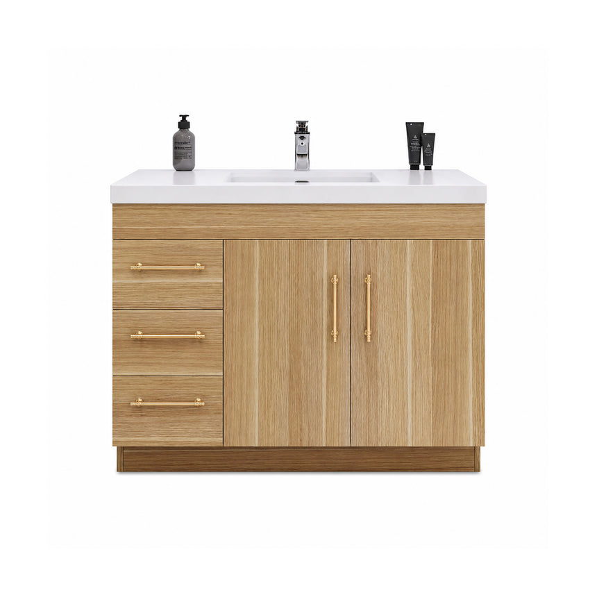 Bathroom with wooden vanity, sink, and decorative elements.