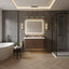 Modern bathroom with a freestanding bathtub, vanity, and shower area.