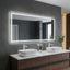Bathroom vanity with two sinks, a large illuminated mirror, and decorative elements.