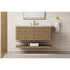 Solid Wood Bathroom vanity with marble countertop, and gold fixtures.