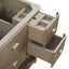 Beige bathroom vanity with open drawers on a white background
