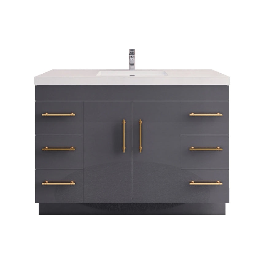 Bathroom with wooden vanity, sink, and decorative elements.