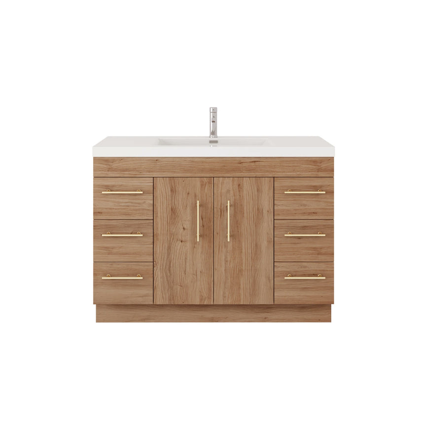 Bathroom with wooden vanity, sink, and decorative elements.
