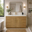 Modern bathroom with wooden vanity, sink, and decorative elements.