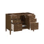 Wooden vanity with multiple drawers on a white background