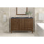 Brickendon Modern Vanity with mirror, sink, and decorative elements in a tiled bathroom.