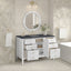 Bathroom vanity with open cabinet doors, round mirror, and decorative elements.