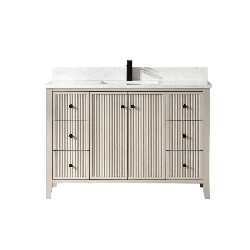 Bathroom vanity with double sink, mirrors, and towels in a well-lit room.