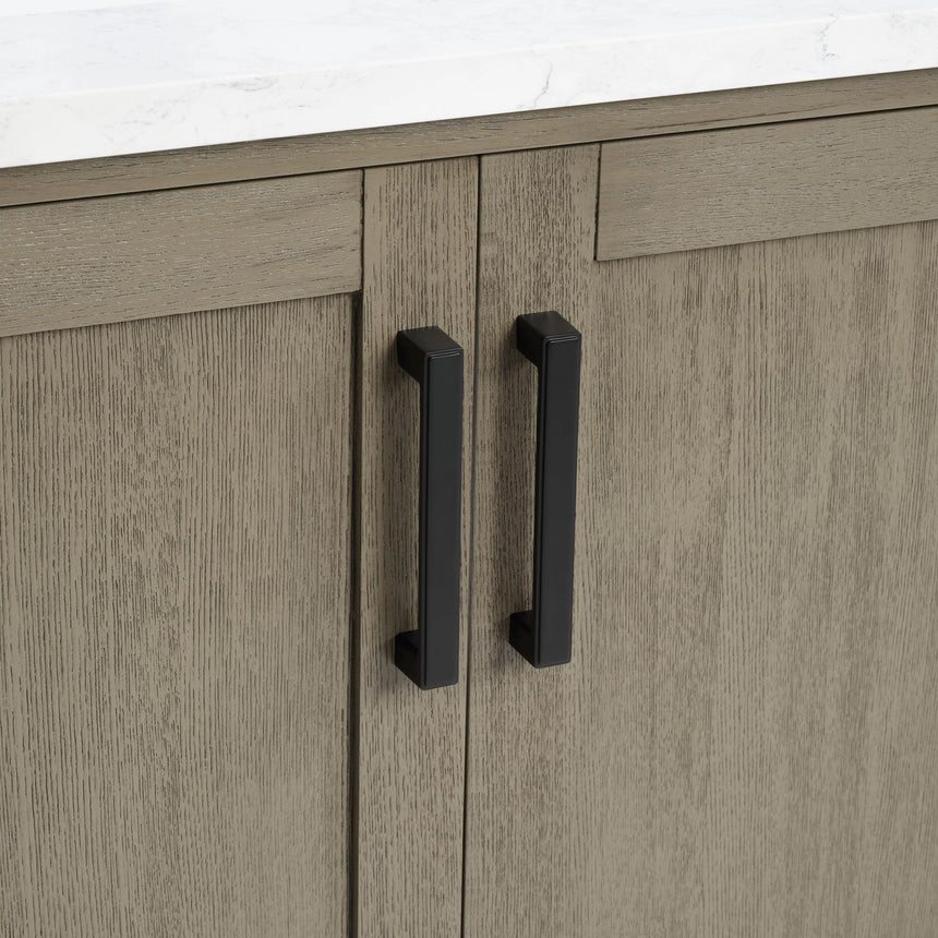 Bathroom vanity with wooden cabinets and white countertop, featuring a toilet and towel on the side.
