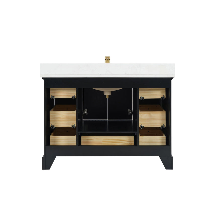 Bathroom vanity with wooden cabinet and white countertop in a bathroom setting.