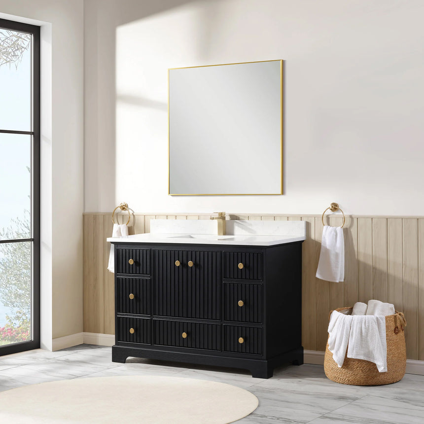 Bathroom vanity with wooden cabinet and white countertop in a bathroom setting.
