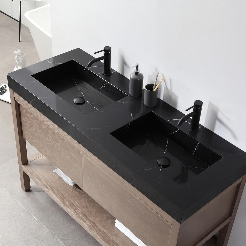 Bathroom vanity with black countertop and wooden cabinet in a bright room.