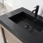 Black marble sink with a black faucet in a bathroom setting