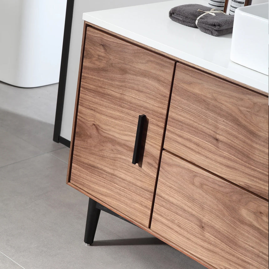 Bathroom vanity with two sinks, mirrors, and decorative elements.
