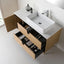 Bathroom vanity with open drawer, sink, and toiletries on a light background