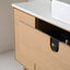Wooden cabinet with open drawer in a bathroom setting