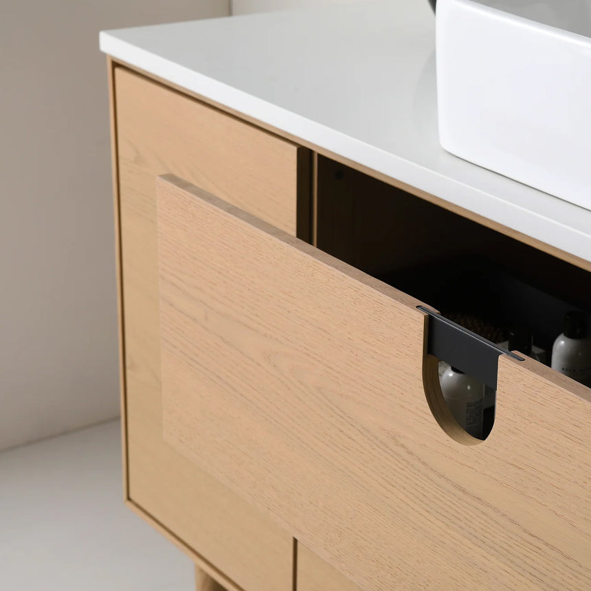 Bathroom vanity with two sinks, mirrors, and decorative elements.