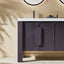 Bathroom vanity with dark wood finish and white countertop