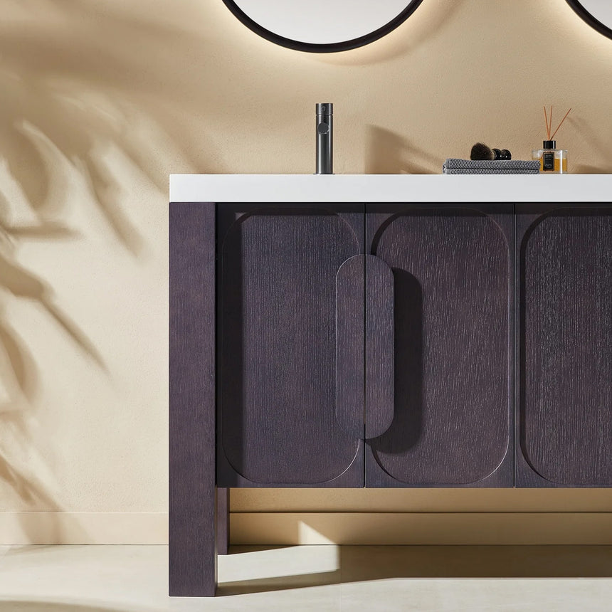 Bathroom with wooden vanity, white countertop, and decorative elements.
