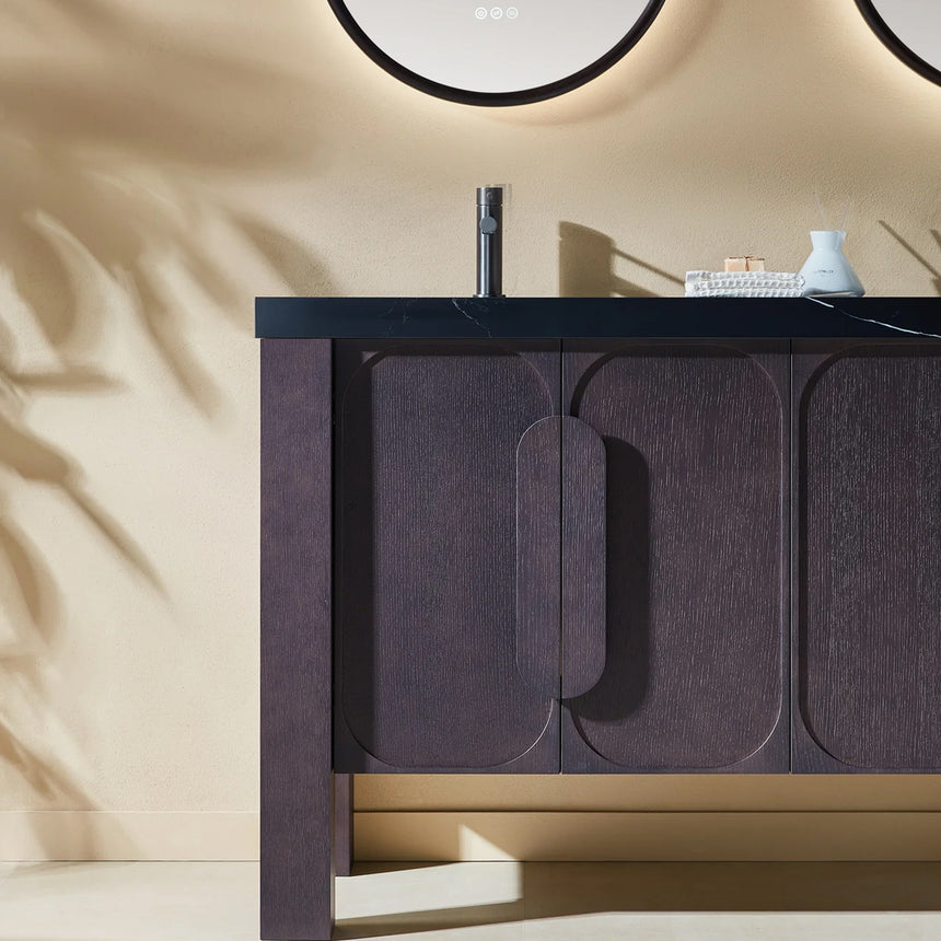 Bathroom with wooden vanity, white countertop, and decorative elements.