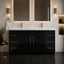 Modern bathroom vanity with black cabinets, gold fixtures, and marble walls.