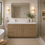 Modern bathroom with wooden vanity, sink, and decorative elements.