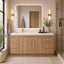 Bathroom with wooden vanity, mirror, and decorative elements