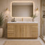 Bathroom with wooden vanity, mirror, and decorative elements