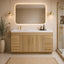 Bathroom with wooden vanity, mirror, and decorative elements