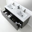 A modern double-sink bathroom vanity with a white countertop, two white rectangular basins, matte black faucets, and a dark gray wood-look cabinet with open drawers showing storage compartments and toiletries.