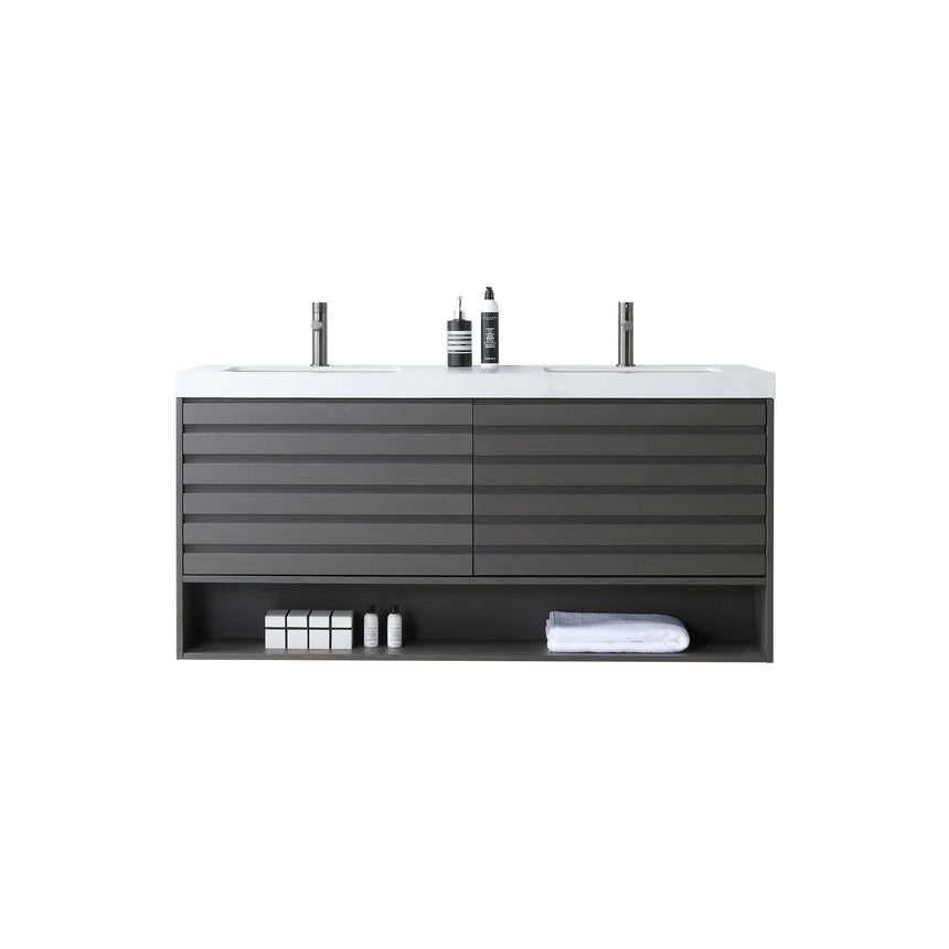 A modern floating bathroom vanity with a light oak wood finish, a white countertop, and an integrated sink, shown in a styled bathroom setting with a bathtub, shower glass, and decorative plants.