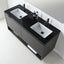 A modern double-sink bathroom vanity with a black marble-look countertop, black wood-look cabinet with horizontal slats, and two white rectangular basins with black faucets.