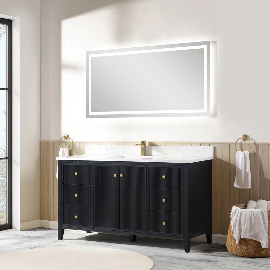 Bathroom vanity with double sink, mirrors, and towels in a well-lit room.