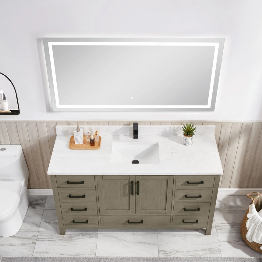 Bathroom vanity with wooden cabinets and white countertop, featuring a toilet and towel on the side.