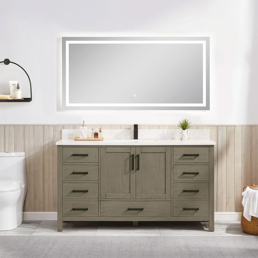 Bathroom vanity with wooden cabinets and white countertop, featuring a toilet and towel on the side.
