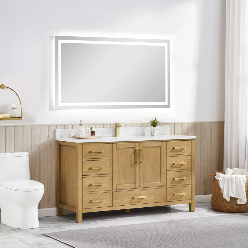 Bathroom vanity with wooden cabinets and white countertop, featuring a toilet and towel on the side.