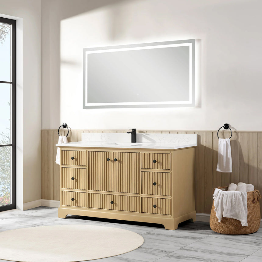 Bathroom vanity with wooden cabinet and white countertop in a bathroom setting.