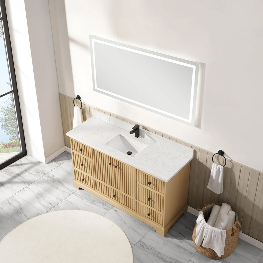 Bathroom vanity with wooden cabinet and white countertop in a bathroom setting.