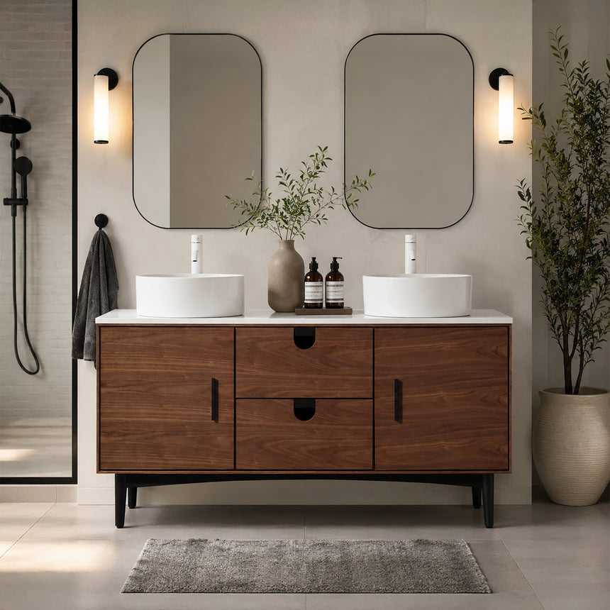 Bathroom vanity with two sinks, mirrors, and decorative elements.